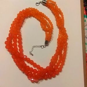 Four strand peach orange acrylic necklace